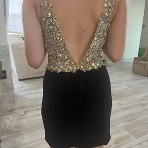 Jovani black and embellished mini dress size 6. Fits like size 4.